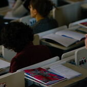 The audience of the conference listens to the lecture