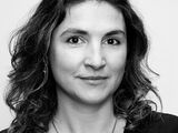 Black and white portrait of Minou Arjomand.