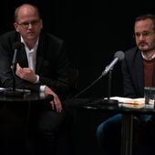 Stefan Willer speaks in one microphone, Jonas Lüscher sits next to him behind a second microphone