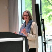 Franziska Thun-Hohenstein stands at the lectern and speaks.