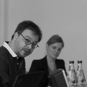 Black and white photograph of a conference theme.