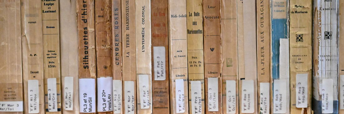 Back cover of old French books with library signatures.