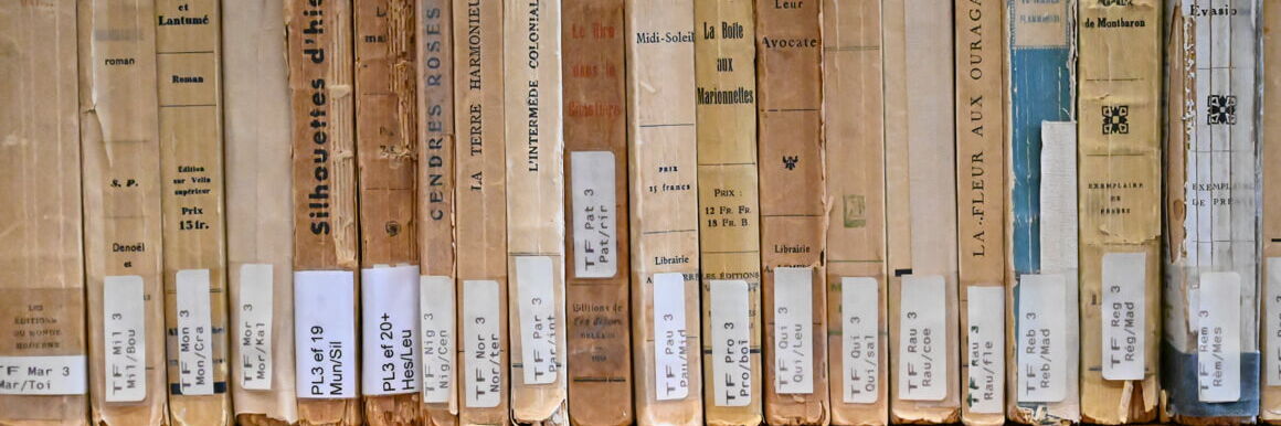 Back cover of old French books with library signatures.