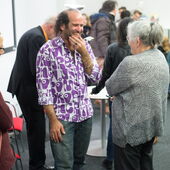 Tomer Gardi speaks to a participants after the panel